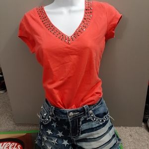 Short sleeve shirt and short shorts.